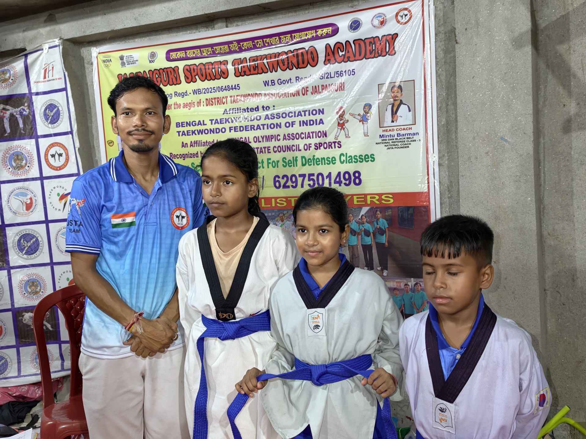 Blue-belt students with the coach